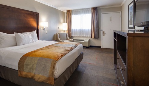 Chambre Standard, 1 grand lit, accessible aux personnes à mobilité réduite (Walk-in Shower)