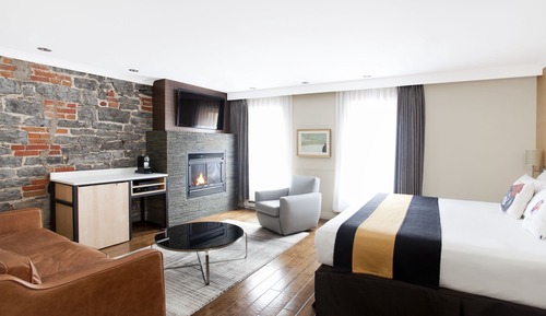 Chambre Deluxe, 1 très grand lit, cheminée