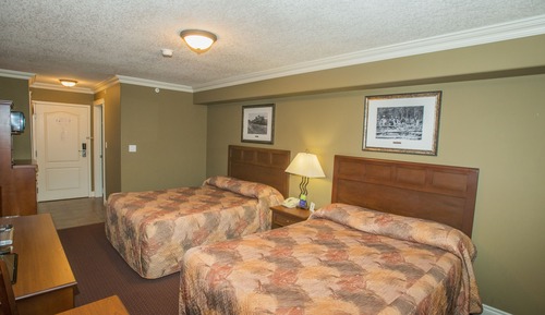 Chambre Double Tradition pour 1 personne, 2 grands lits