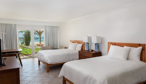 Chambre, 2 lits doubles, terrasse, en front de plage