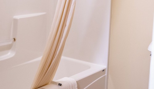 Suite Premium, 1 très grand lit et 1 canapé-lit, bain à remous
