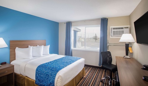 Chambre, 1 grand lit, accessible aux personnes à mobilité réduite, non-fumeurs (Mobility Room)