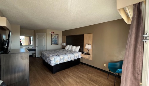 Chambre Deluxe, 1 très grand lit, accessible aux personnes à mobilité réduite, non-fumeurs