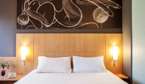 Chambre, plusieurs lits