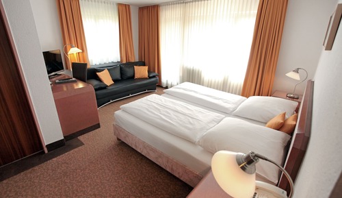 Chambre Triple Confort, 1 lit double et 1 canapé-lit
