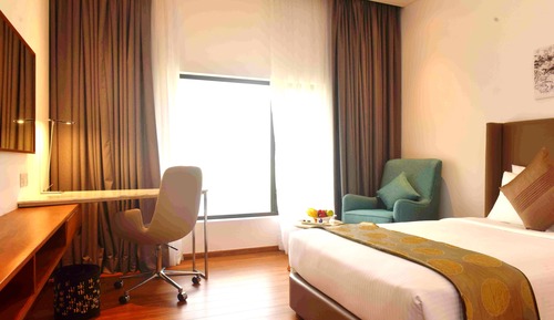 Deluxe Twin Room with One way Airport Transfer including 15% off on F&B & Spa