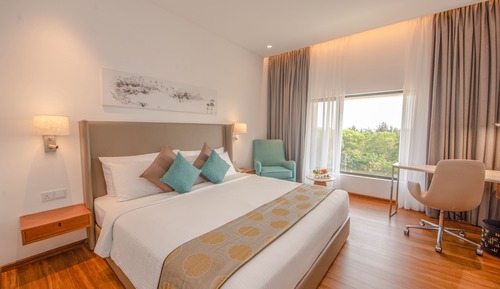 Deluxe King Room with One way Airport Transfer including 15% off on F&B & Spa