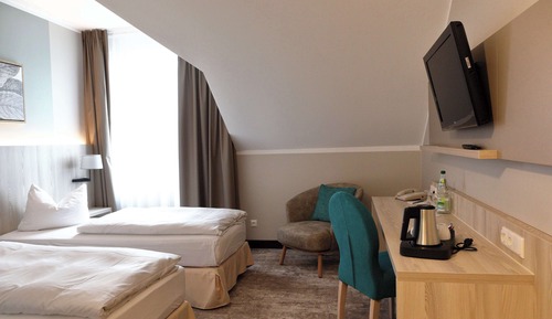 Chambre Confort, 2 lits une place, baignoire