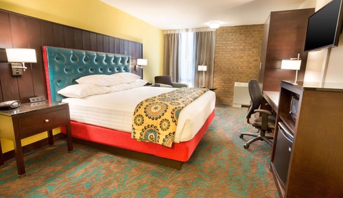 Chambre Deluxe, 1 très grand lit, réfrigérateur et four à micro-ondes