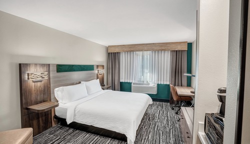 Suite, 1 très grand lit, accessible aux personnes à mobilité réduite (Accessible Tub)