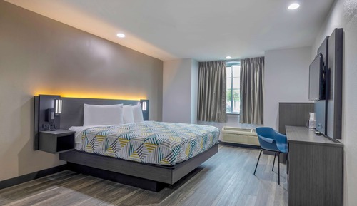 Suite Deluxe, 1 très grand lit, non-fumeurs, réfrigérateur et four à micro-ondes