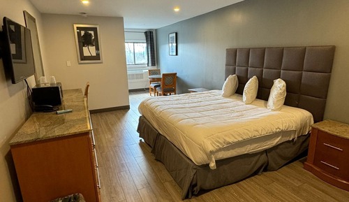 Chambre Standard, 1 très grand lit, fumeurs
