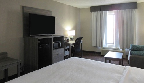 Chambre Standard, 1 très grand lit, non-fumeurs, baignoire à jets