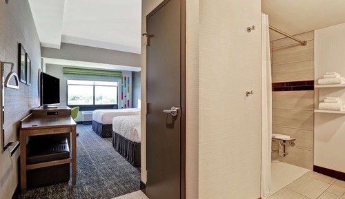 Chambre Signature, 2 grands lits, accessible aux personnes à mobilité réduite