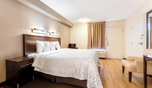 Chambre Deluxe, 1 très grand lit, accessible aux personnes à mobilité réduite (Smoke Free)