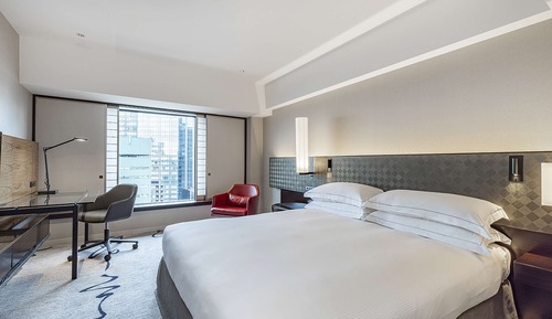 Chambre Exécutive, 1 très grand lit, accès au salon club