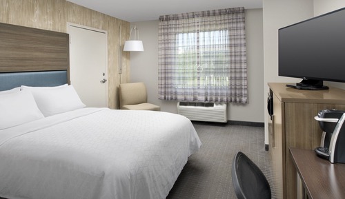 Suite, 1 très grand lit, accessible aux personnes à mobilité réduite (Roll-In Shower)