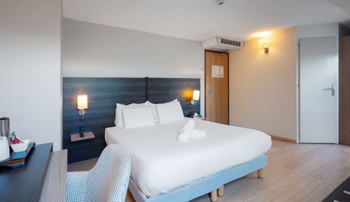 Chambre, plusieurs lits