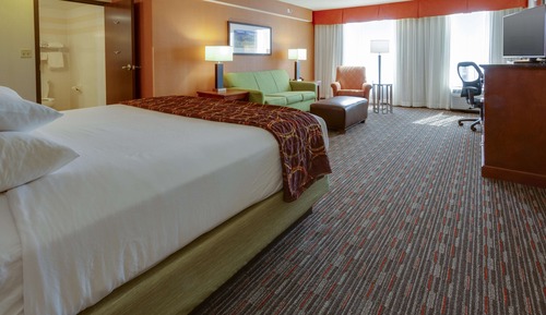 Chambre Deluxe, 1 très grand lit et 1 canapé-lit, réfrigérateur et four à micro-ondes