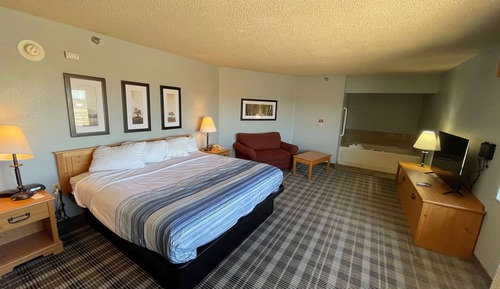 Chambre Deluxe, 1 très grand lit, accessible aux personnes à mobilité réduite, non-fumeurs