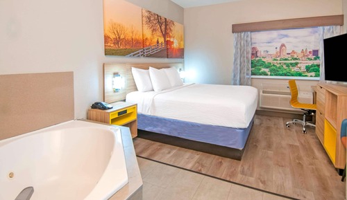 Chambre, 1 très grand lit, non-fumeurs, baignoire à jets