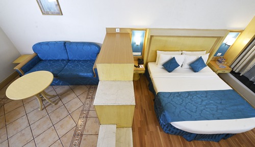 Club Executive King Room with Separate Sofa Seating Area