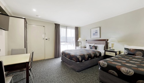 Chambre Exécutive avec lits jumeaux (1 Queen & 1 Single Bed)