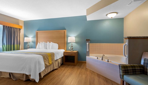 Chambre Standard, 1 très grand lit, non-fumeurs, baignoire à jets