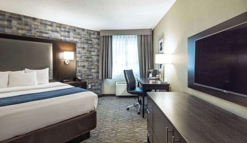 Chambre, 1 très grand lit, non-fumeurs, rez-de-chaussée