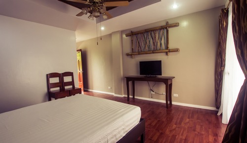 Chambre Standard, 1 grand lit, vue partielle sur l'océan