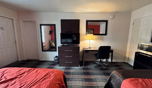 Chambre, plusieurs lits