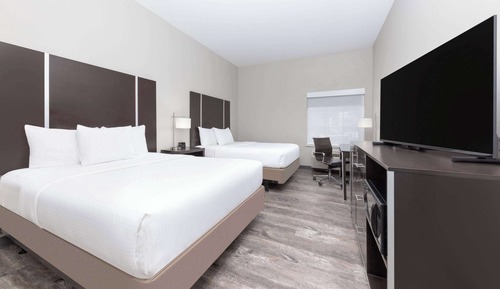 Chambre, 2 grands lits, accessible aux personnes à mobilité réduite (Hearing Accessible)