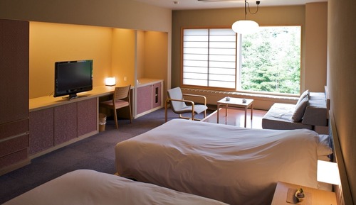 Chambre Deluxe avec lits jumeaux (Female Only Floor)