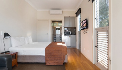 Chambre Exécutive, 1 grand lit, coin cuisine