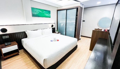 Chambre Deluxe, 1 très grand lit