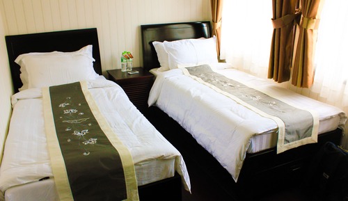 Chambre Luxe Double ou avec lits jumeaux