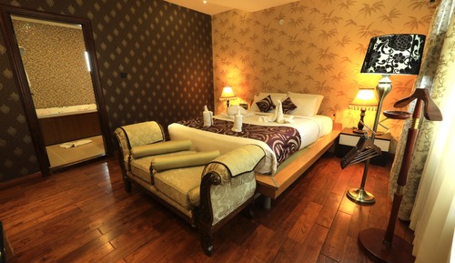 Suite Romantique, 1 lit double, bain à remous