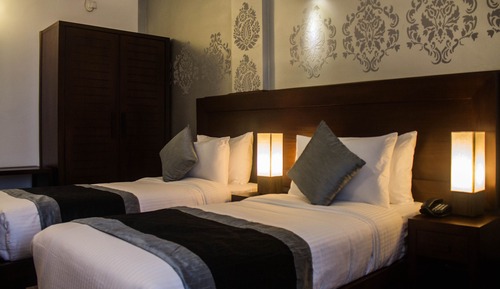 Chambre Deluxe avec lits jumeaux, 2 lits une place