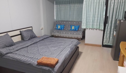 Chambre Double Familiale, 1 lit double et 1 canapé-lit, vue partielle sur la mer