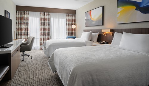Chambre Deluxe, 2 grands lits, accessible aux personnes à mobilité réduite, baignoire