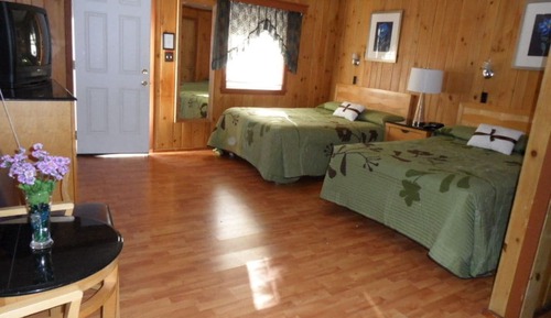 Chambre, plusieurs lits