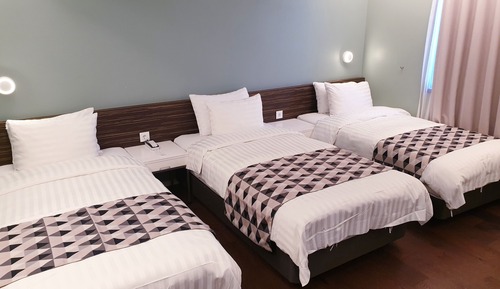 Chambre Triple Deluxe