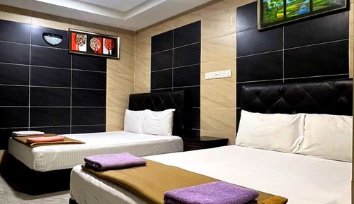 Chambre Quadruple Deluxe