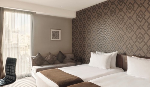 Chambre Deluxe avec lits jumeaux (with Sofa Bed)