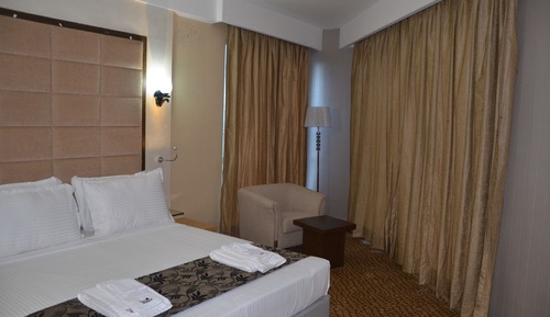 Suite Deluxe, 1 très grand lit, vue montagne, en angle