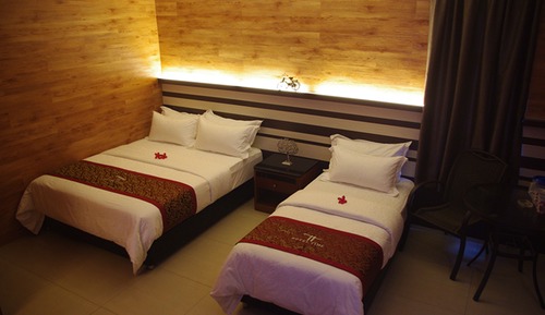 Chambre Triple, vue ville