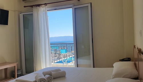 Chambre Triple, vue mer