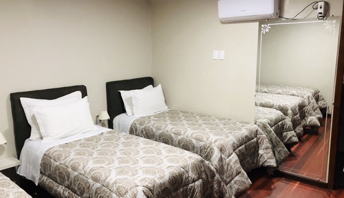 Chambre Deluxe, 3 lits une place