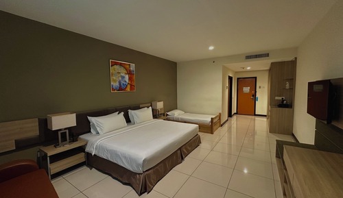 Chambre Triple Deluxe, plusieurs lits