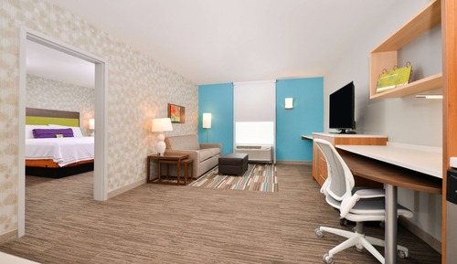 Suite, 1 très grand lit, accessible aux personnes à mobilité réduite (Roll In Shower)